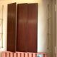 Scandinavian wall-mounted bookcase with floating rosewood shelves, period
