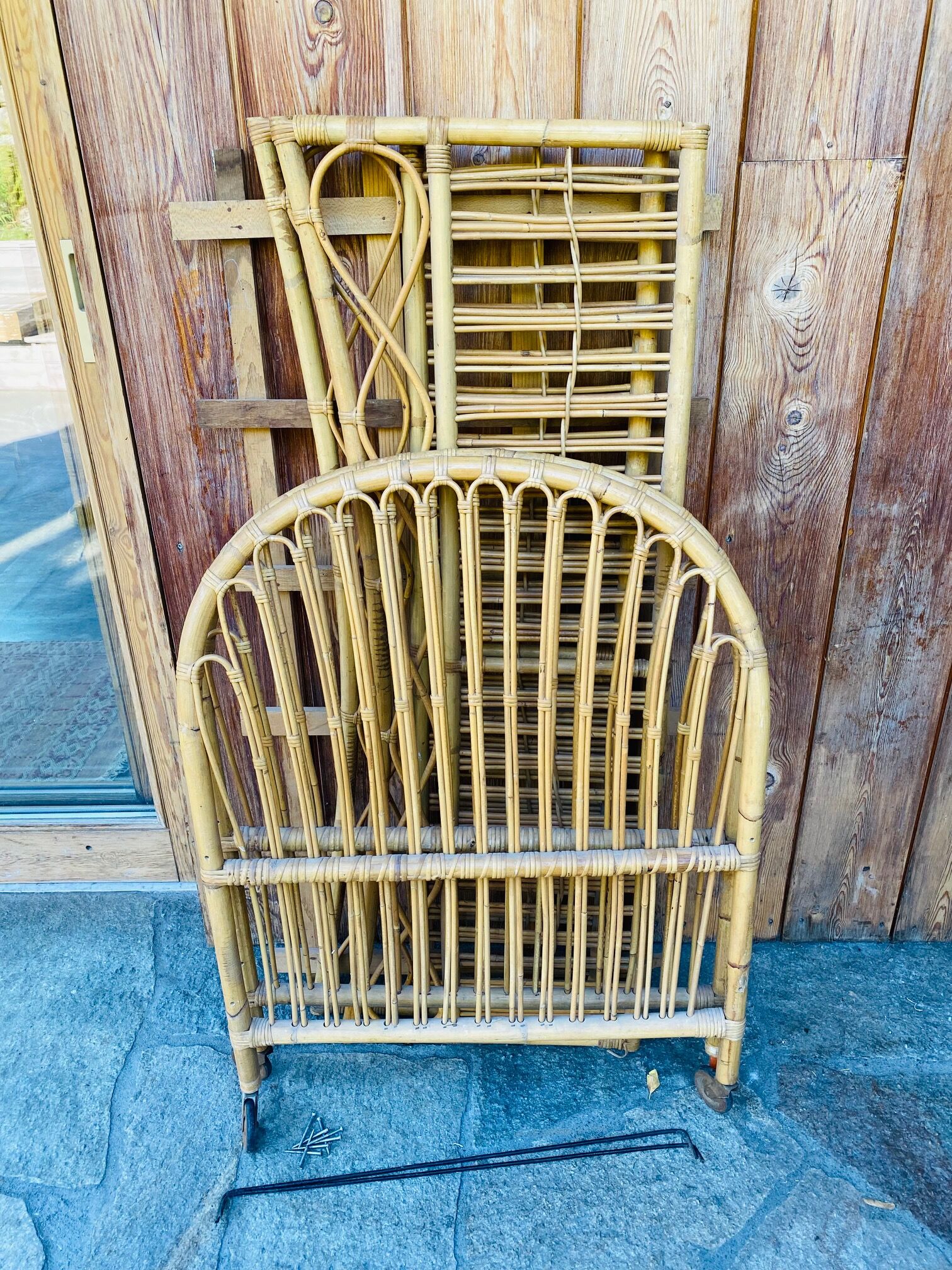 Children's bed in vintage rattan