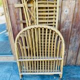 Children's bed in vintage rattan