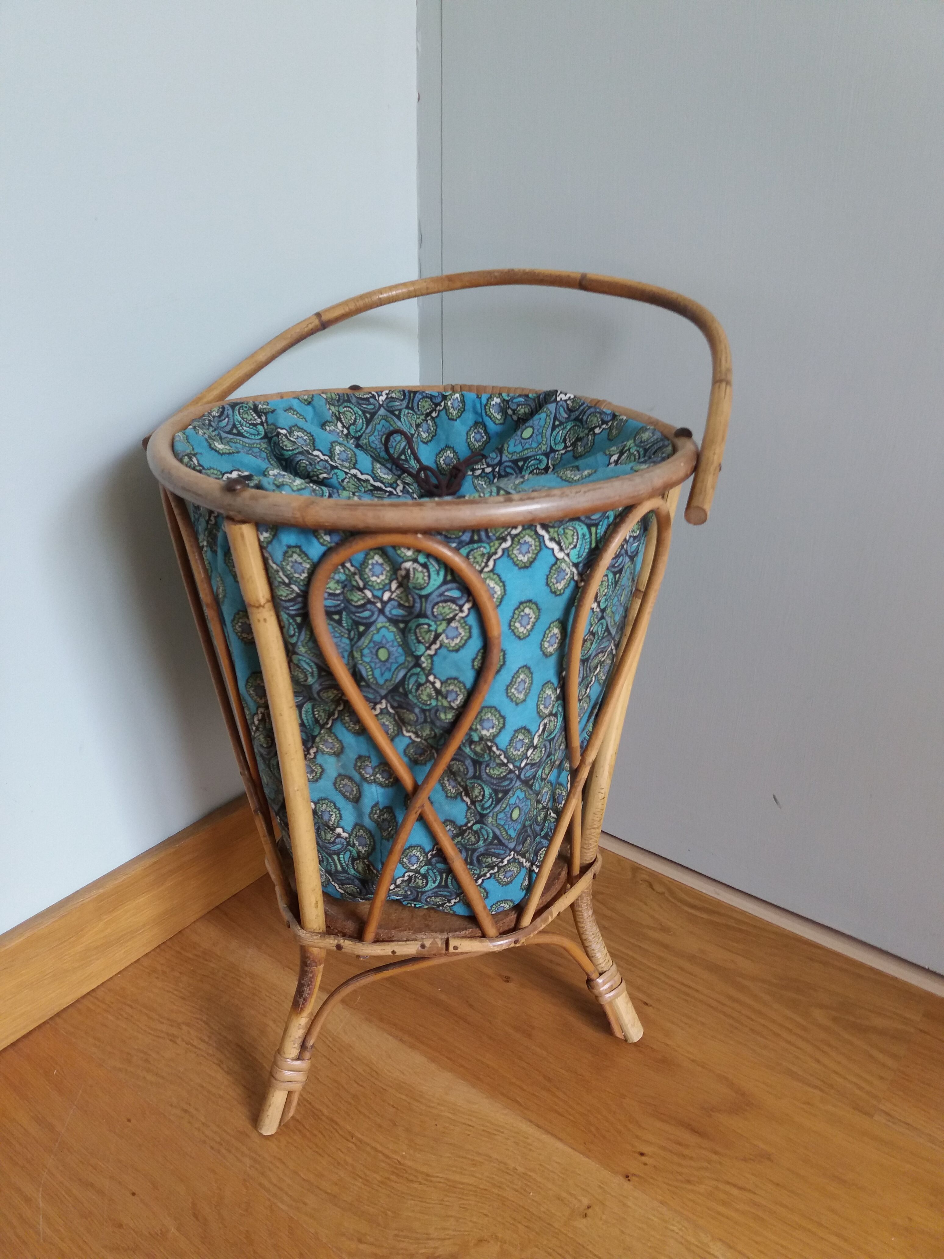 Wicker worker round basket with work, knitting