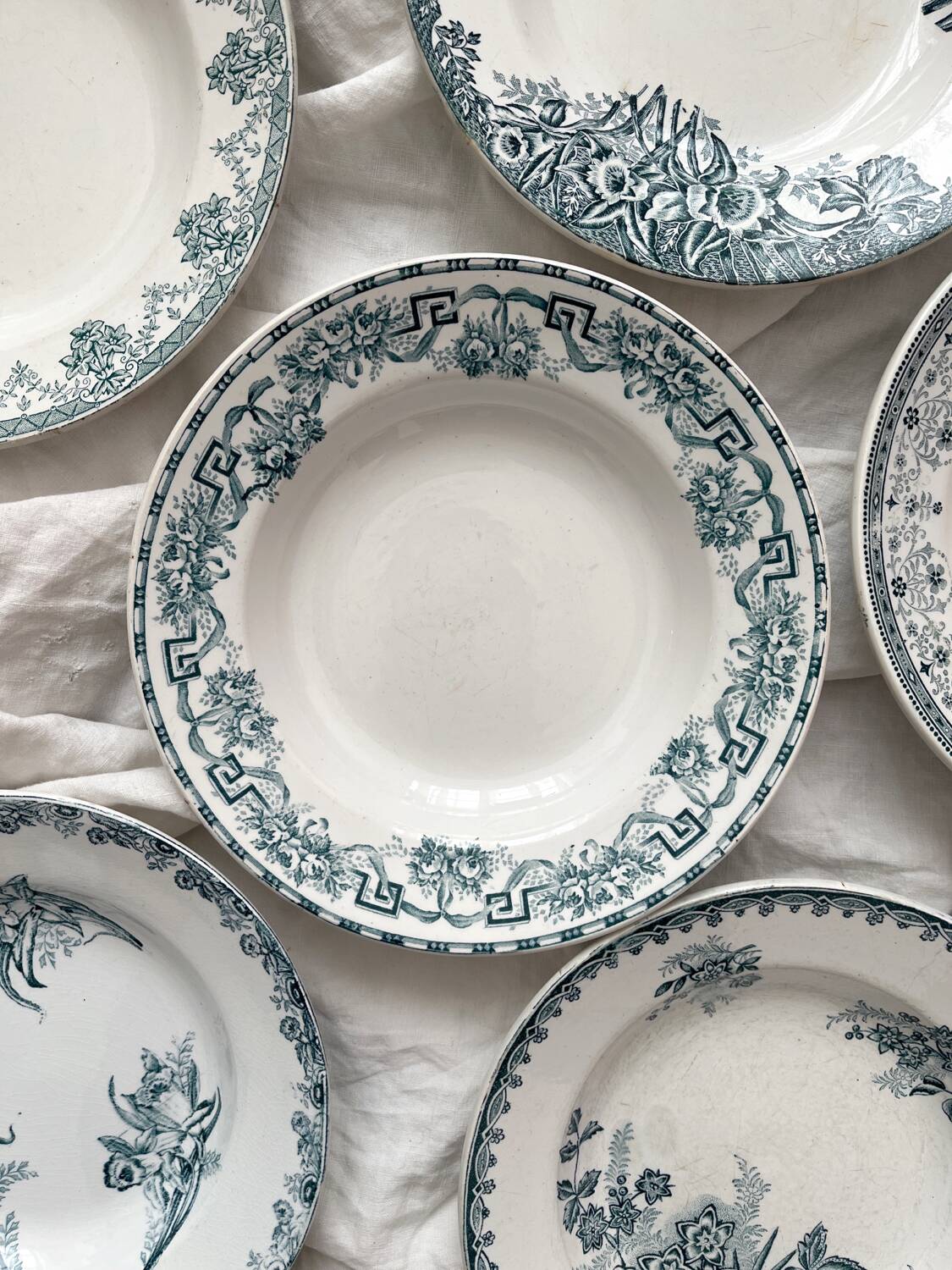 6 mismatched Saint Amand ironstone soup plates