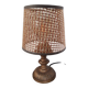 Vintage metal lamp with its caned lampshade