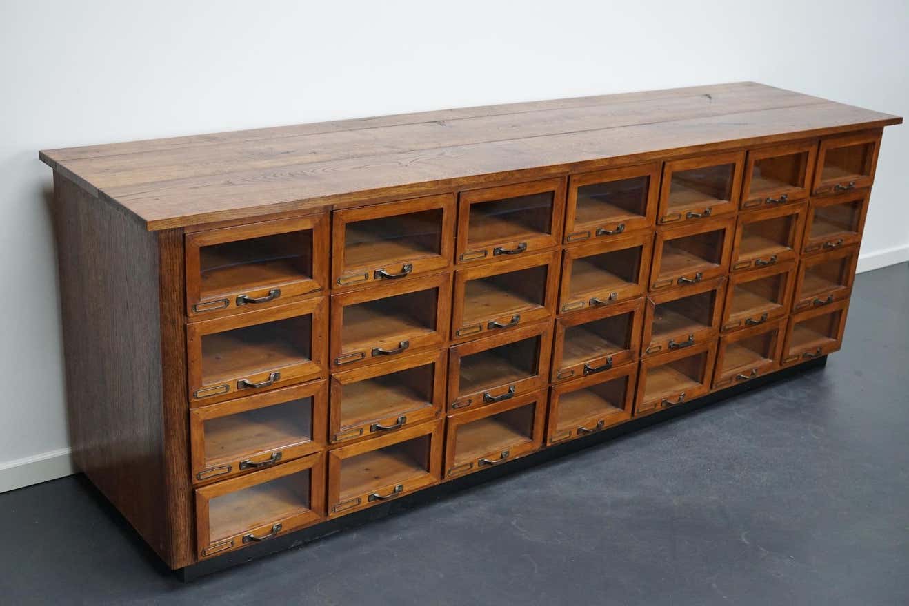 Vintage dutch oak haberdashery cabinet 1930s