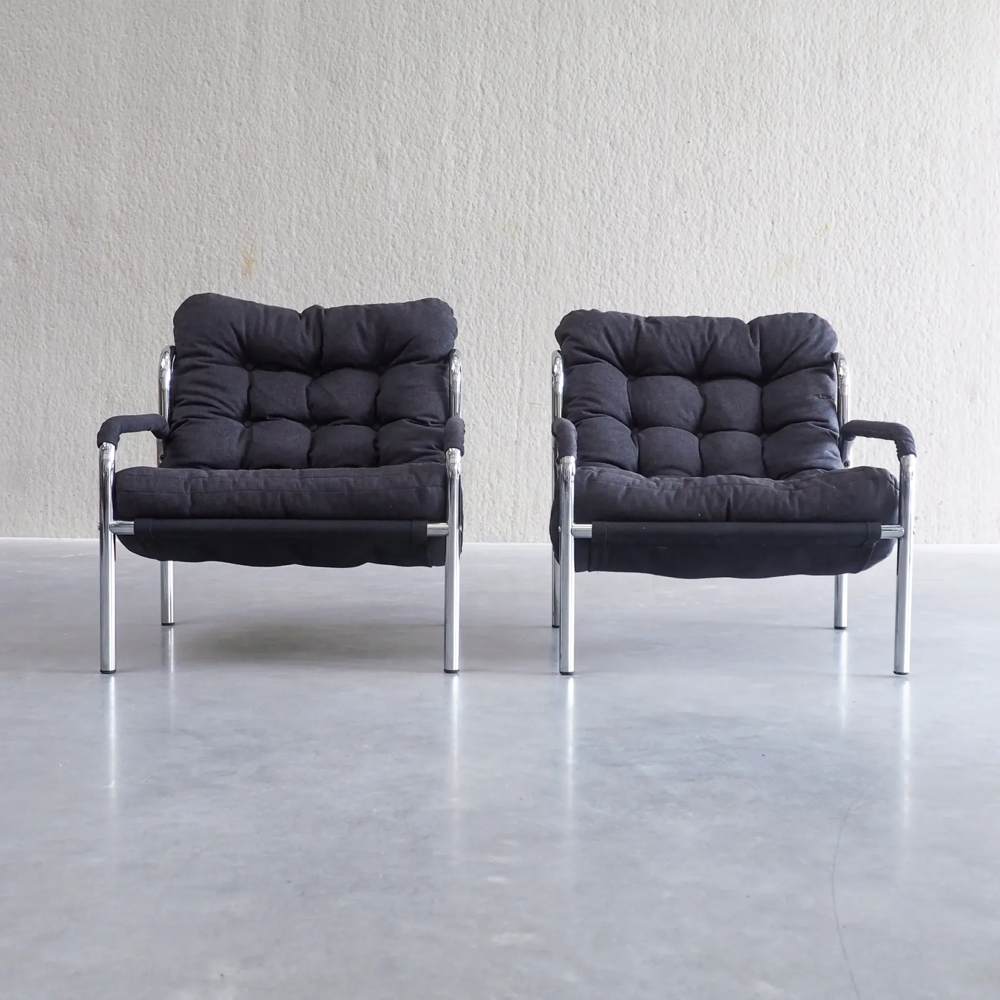 Pair of mid-century modern tubular lounge chairs