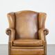 Sheep leather wingback chair with patina