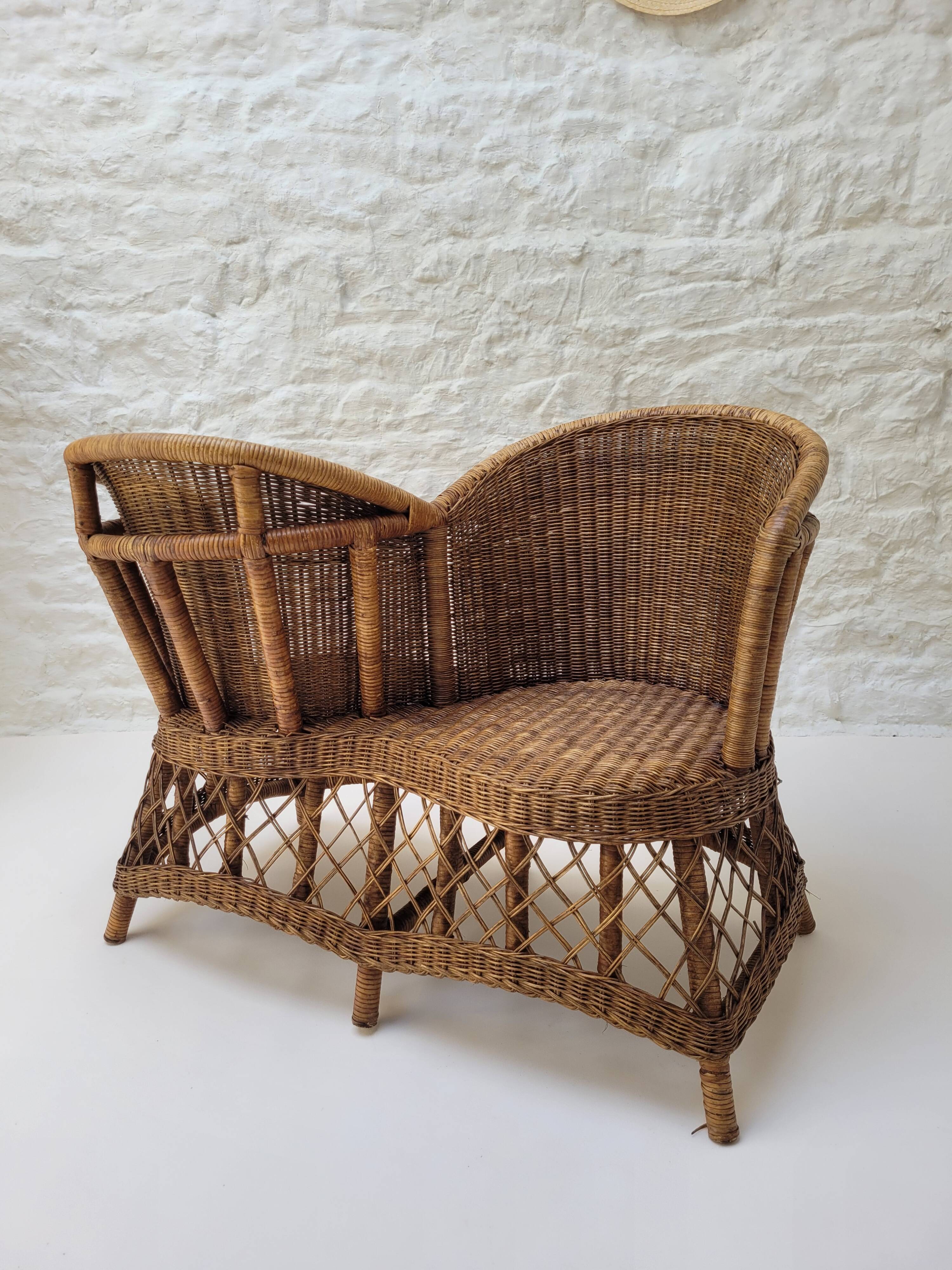 Vintage rattan confidant sofa