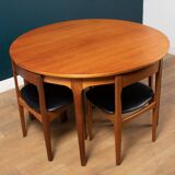 Retro teak 1960s round nathan dining table & space saving 4 chairs