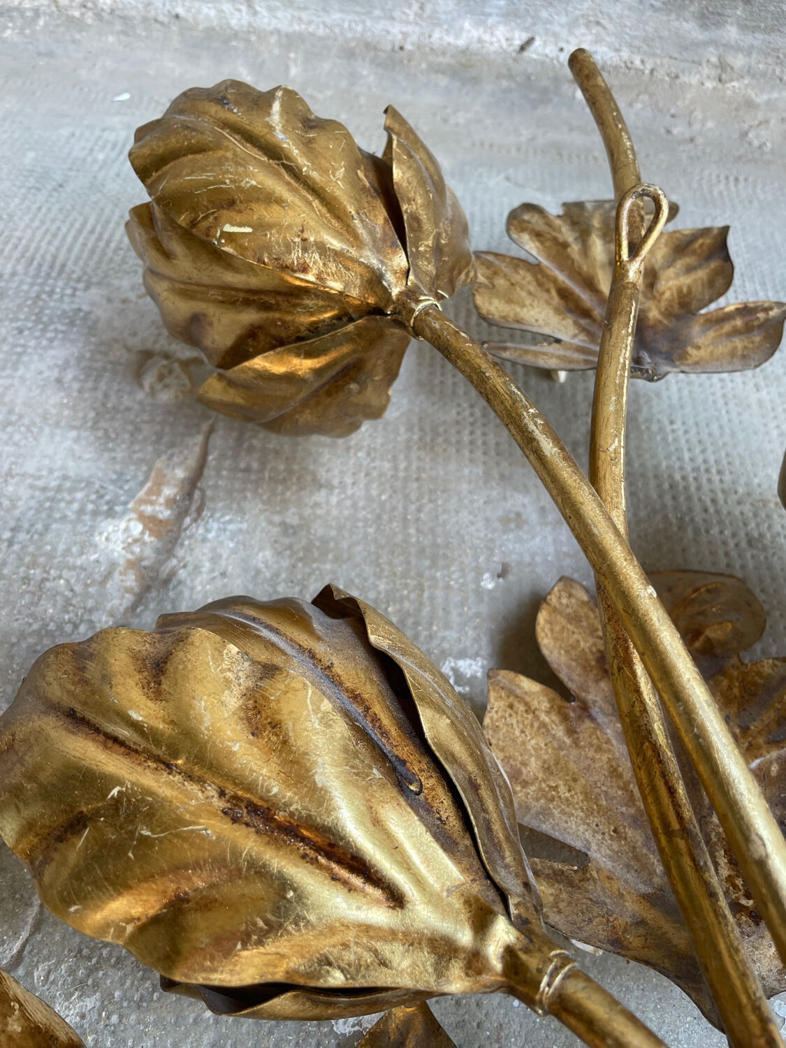 Golden wall lamp foliage