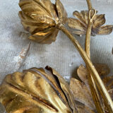 Golden wall lamp foliage