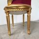 Fauteuil bois doré et velours rouge Louis XVI