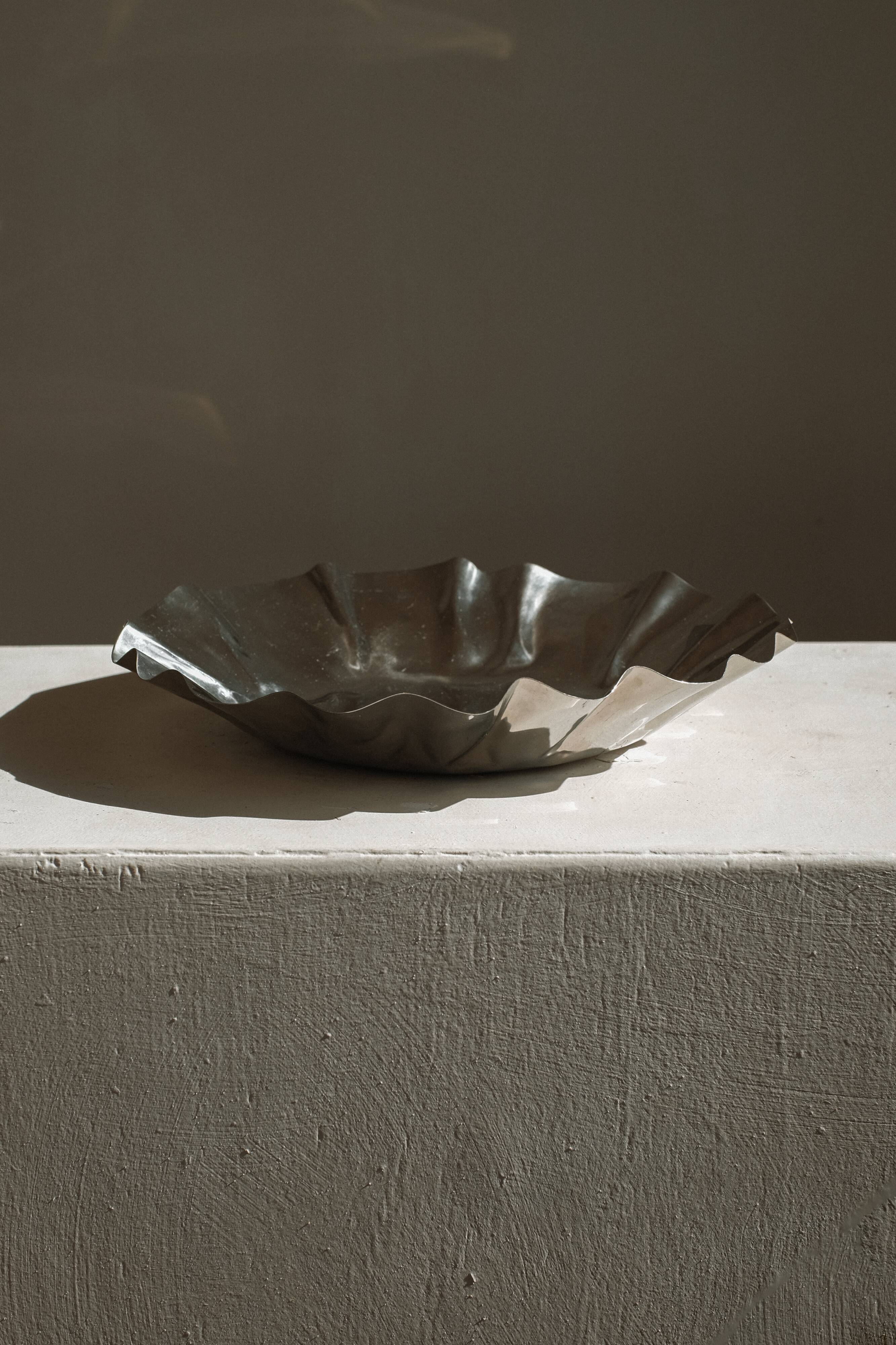 Large folded chrome bowl