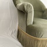 sage green toad armchairs with gold fringe