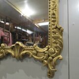 Miroir ancien en bois doré