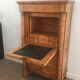 Empire-style secretary desk in burr walnut with detached columns, drop-front, and secret drawer