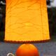 Light wood round foot laying lamp and old lampshade