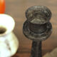 Brutalist wrought iron candle holder beaten