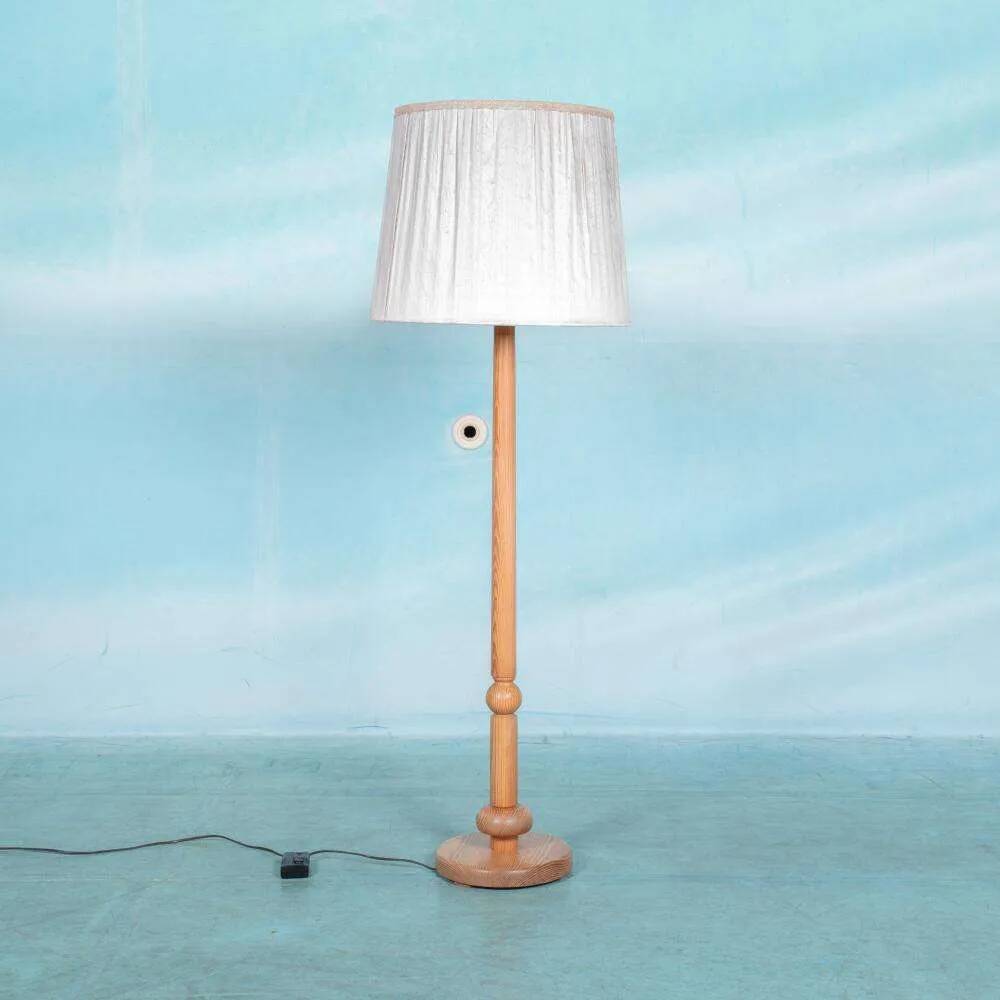 Vintage Swedish wooden floor lamp with pleated shade from the 1960s.
