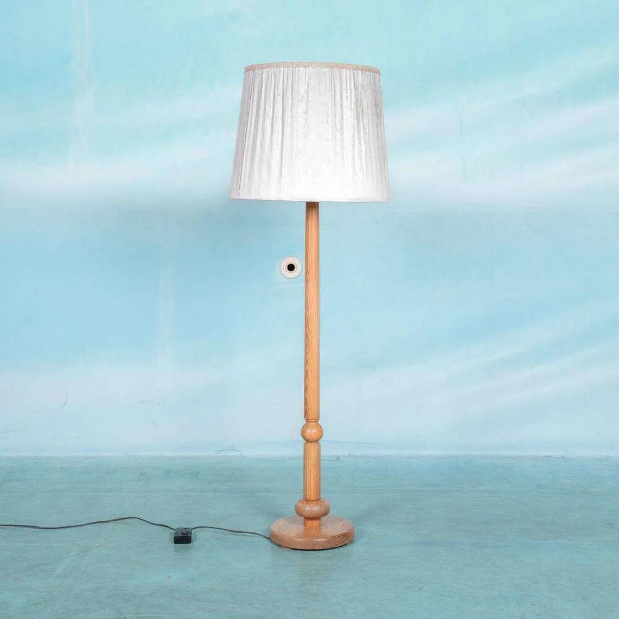 Vintage Swedish wooden floor lamp with pleated shade from the 1960s.