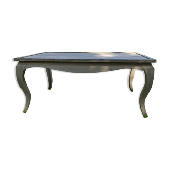 Table on bent legs in a rustic style