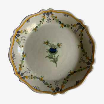 Plate of Nevers in earthenware late eighteenth century decoration of vegetable friezes