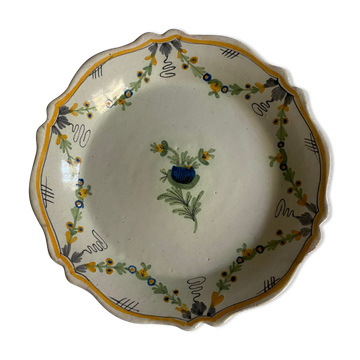 Plate of Nevers in earthenware late eighteenth century decoration of vegetable friezes