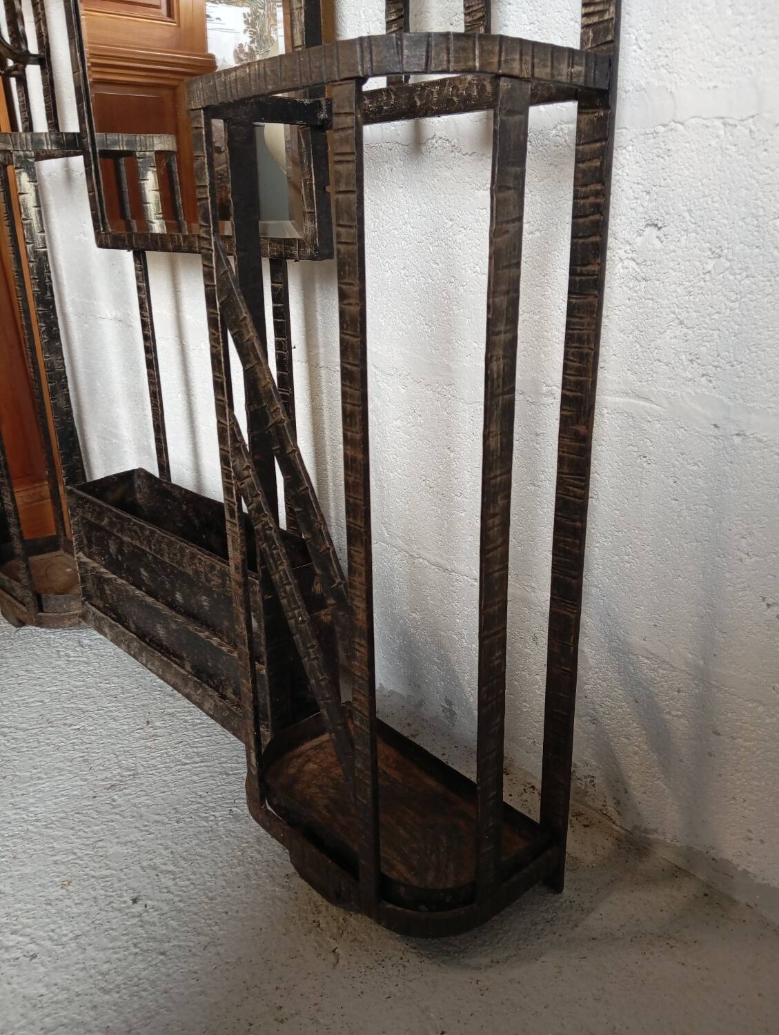Exceptional and imposing hall wardrobe in hammered wrought iron.