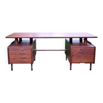 Vintage 1950s teak desk by designer Jacques Hauville