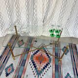 Vintage gold coffee table. Glass top.