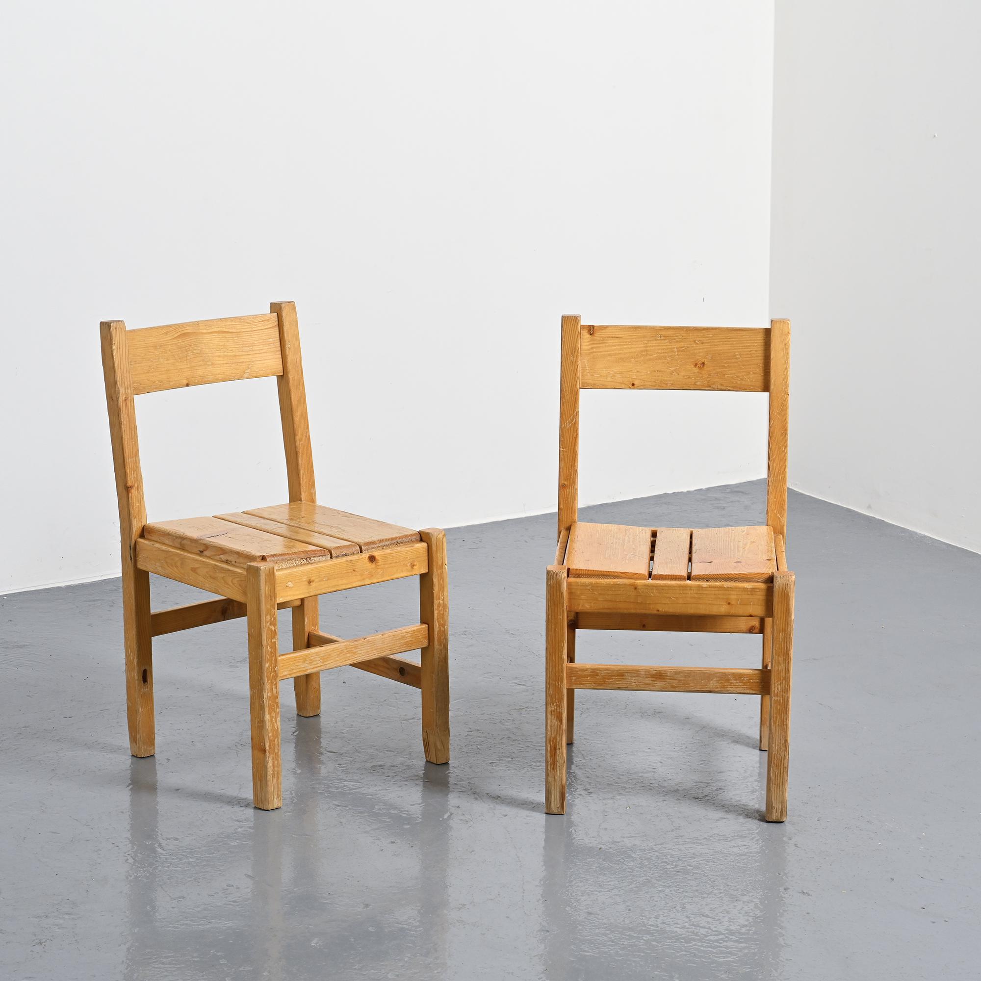 Pair of pine chairs, Maison Regain, France, circa 1970.