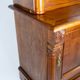 Glass cabinet of light walnu from the 1880s