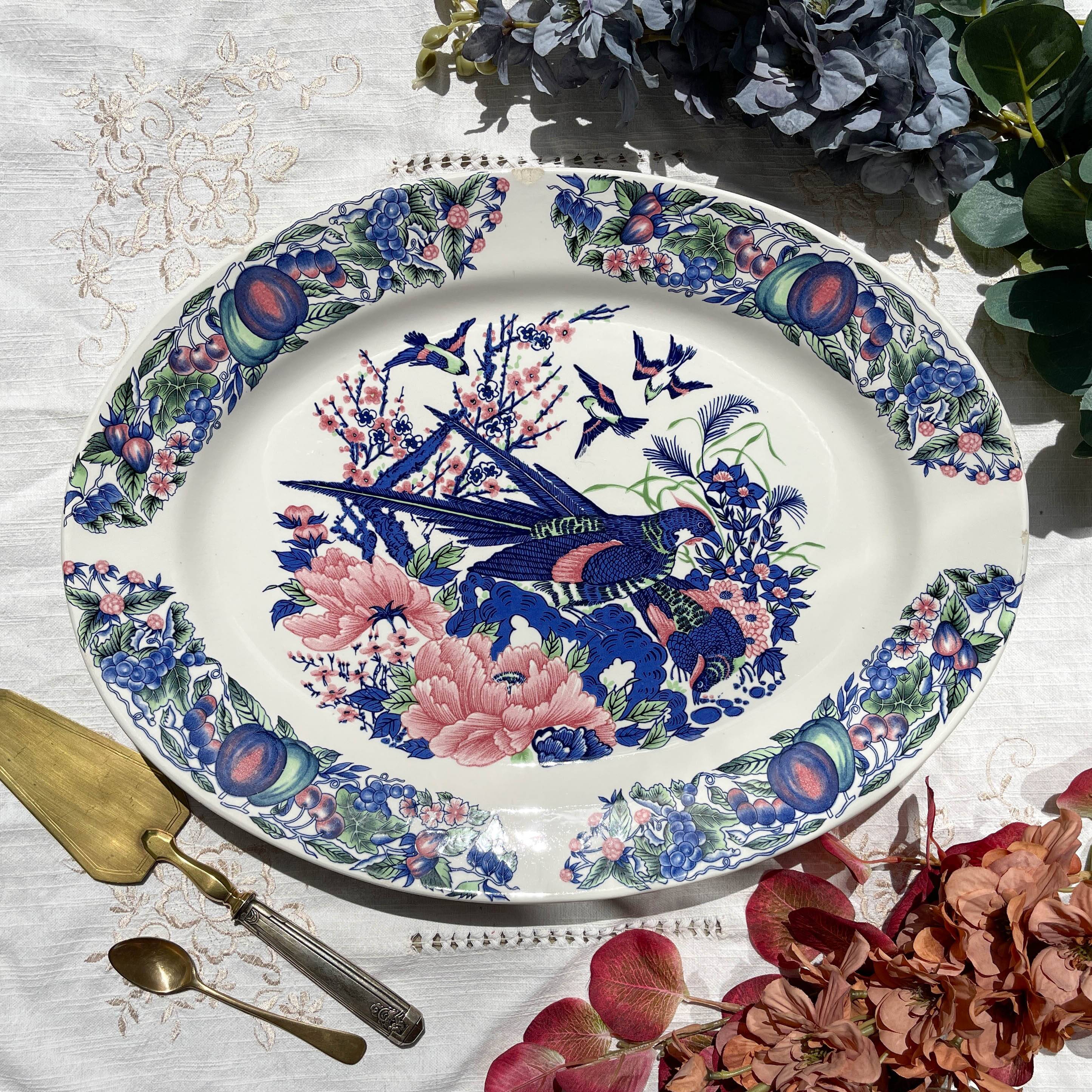 Large antique oval platter in Italian Stoviglierie earthenware – blue, green, and pink bird and flower motif