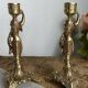 Paire de bougeoirs en bronze, porteuses d’eau