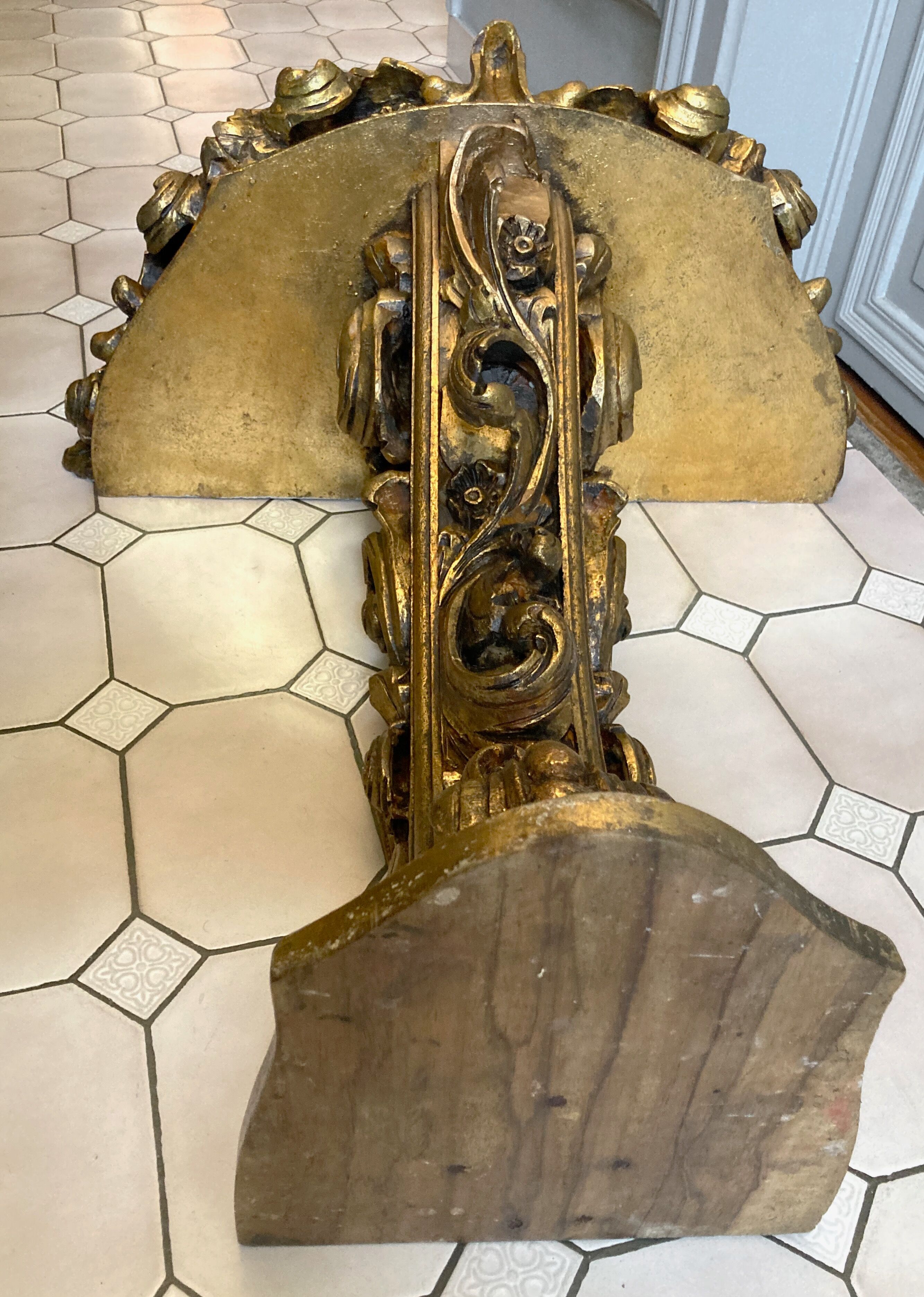 Carved wooden and marble console