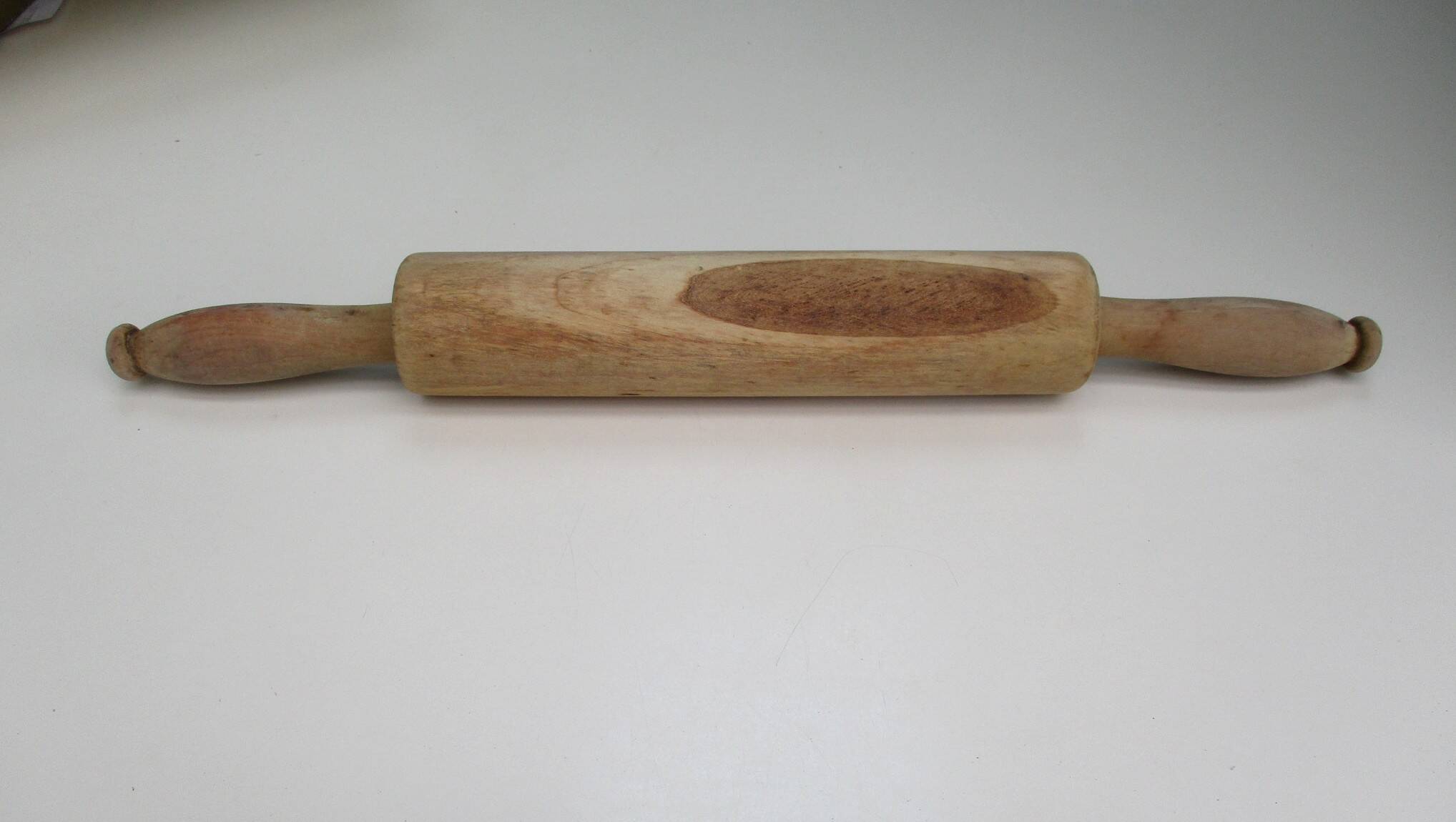 Vintage rolling pin, made of wood.