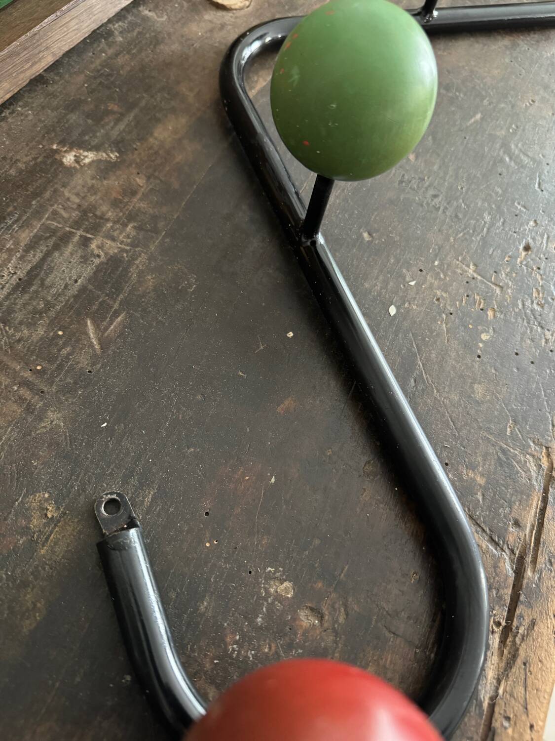 Wall coat rack with 4 wooden balls