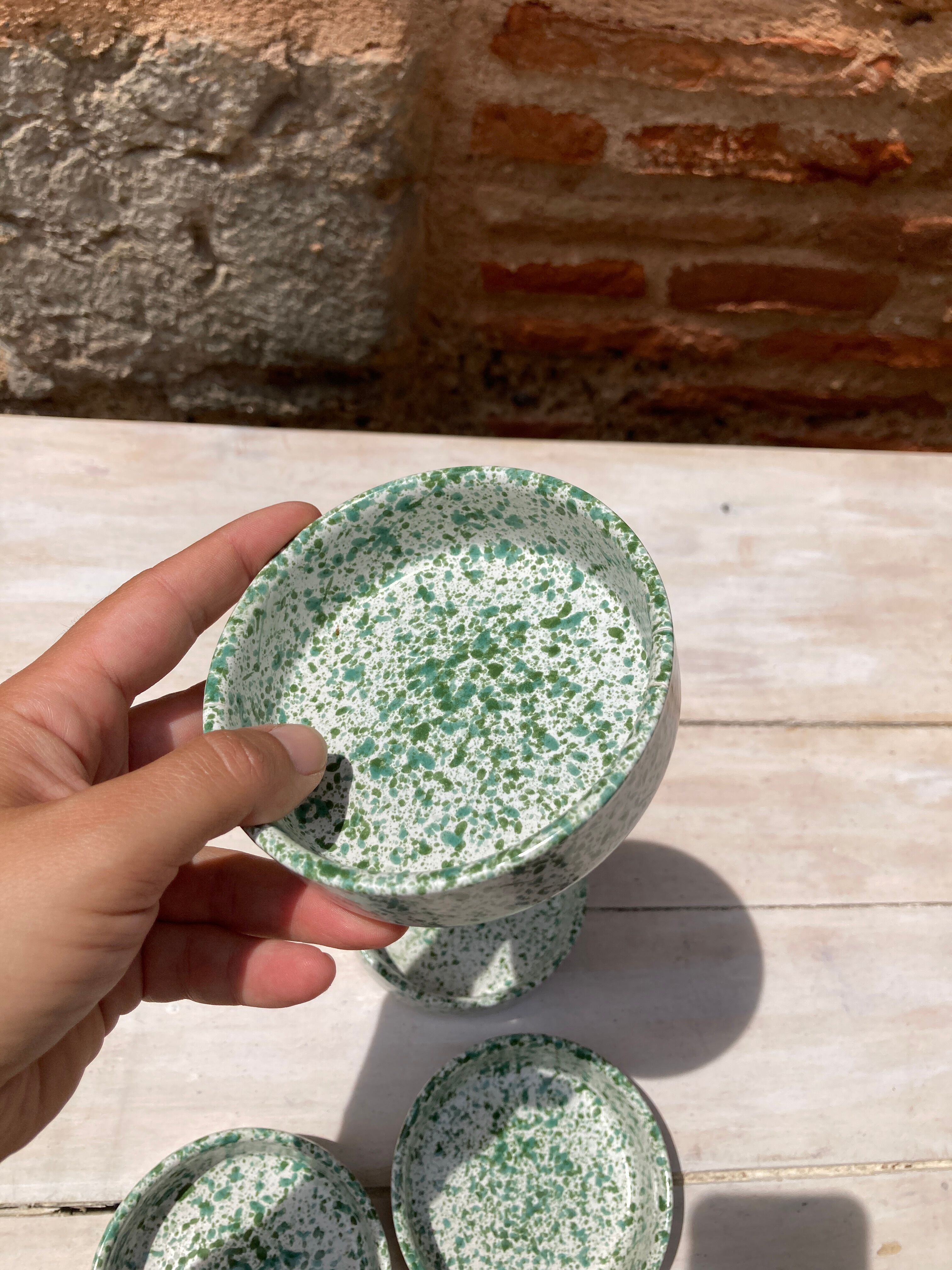 Four spotted green ramekins