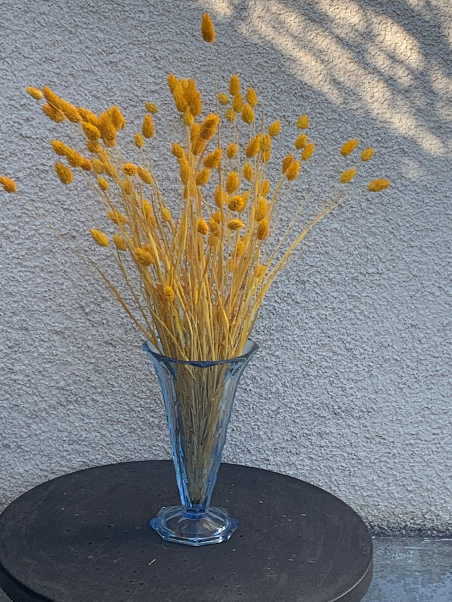 Blue molded glass vase in art deco relief