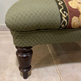 Vintage upholstered footstool, floral decor in Aubusson style.