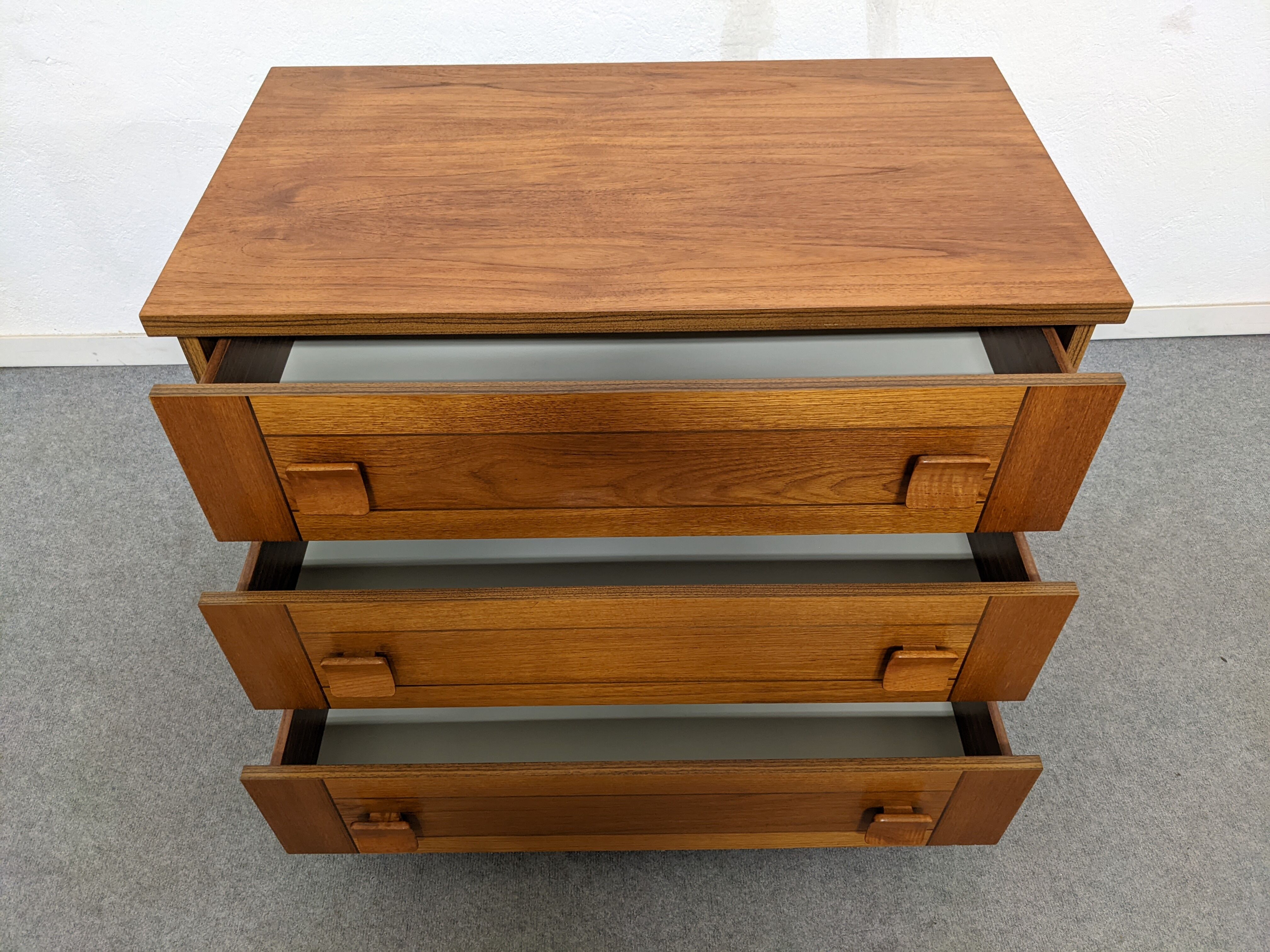 Vintage teak and rosewood chest of drawers from the 70-80s