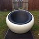 Armchair design egg pod ball chair iconik white and imitation black leather as it is.