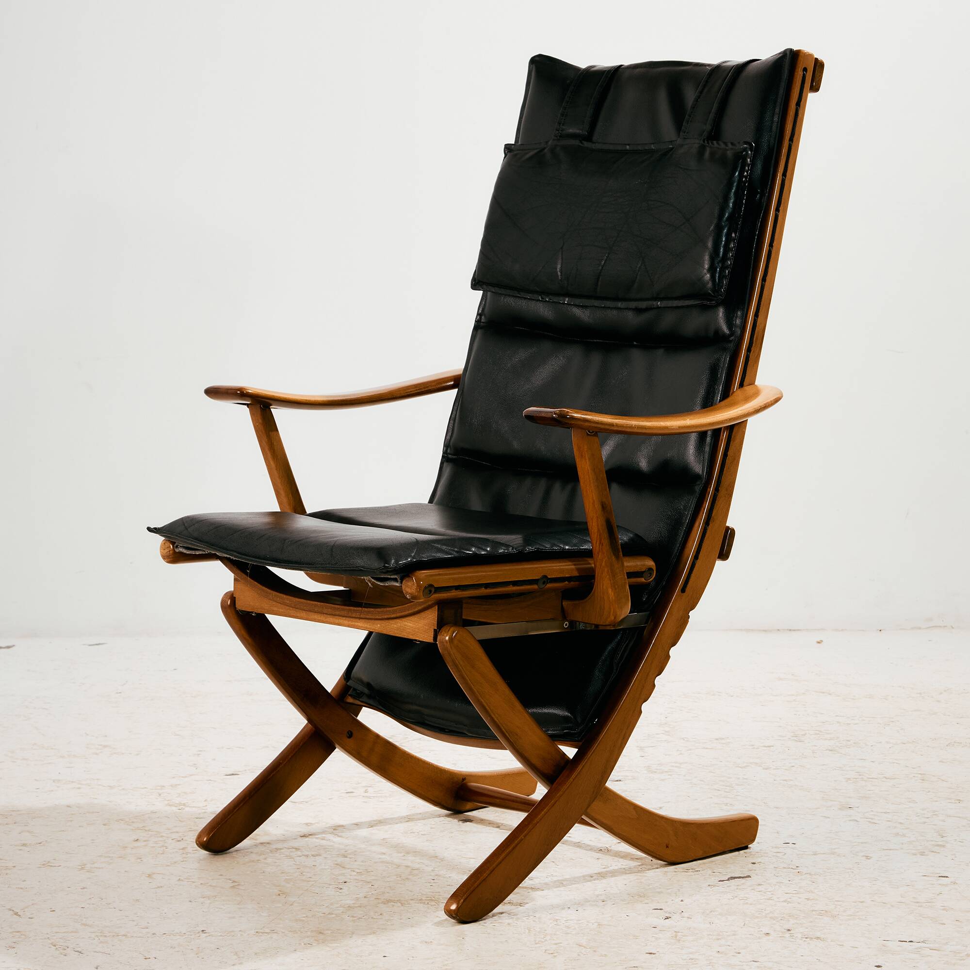 Beech armchair with leather upholstery