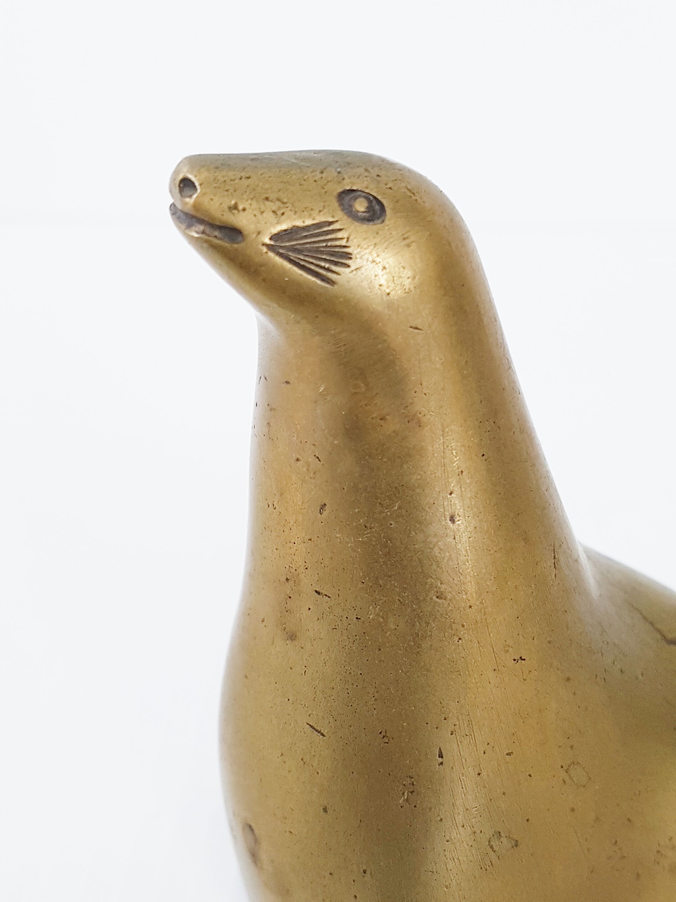 Gilt bronze sea lion 1970