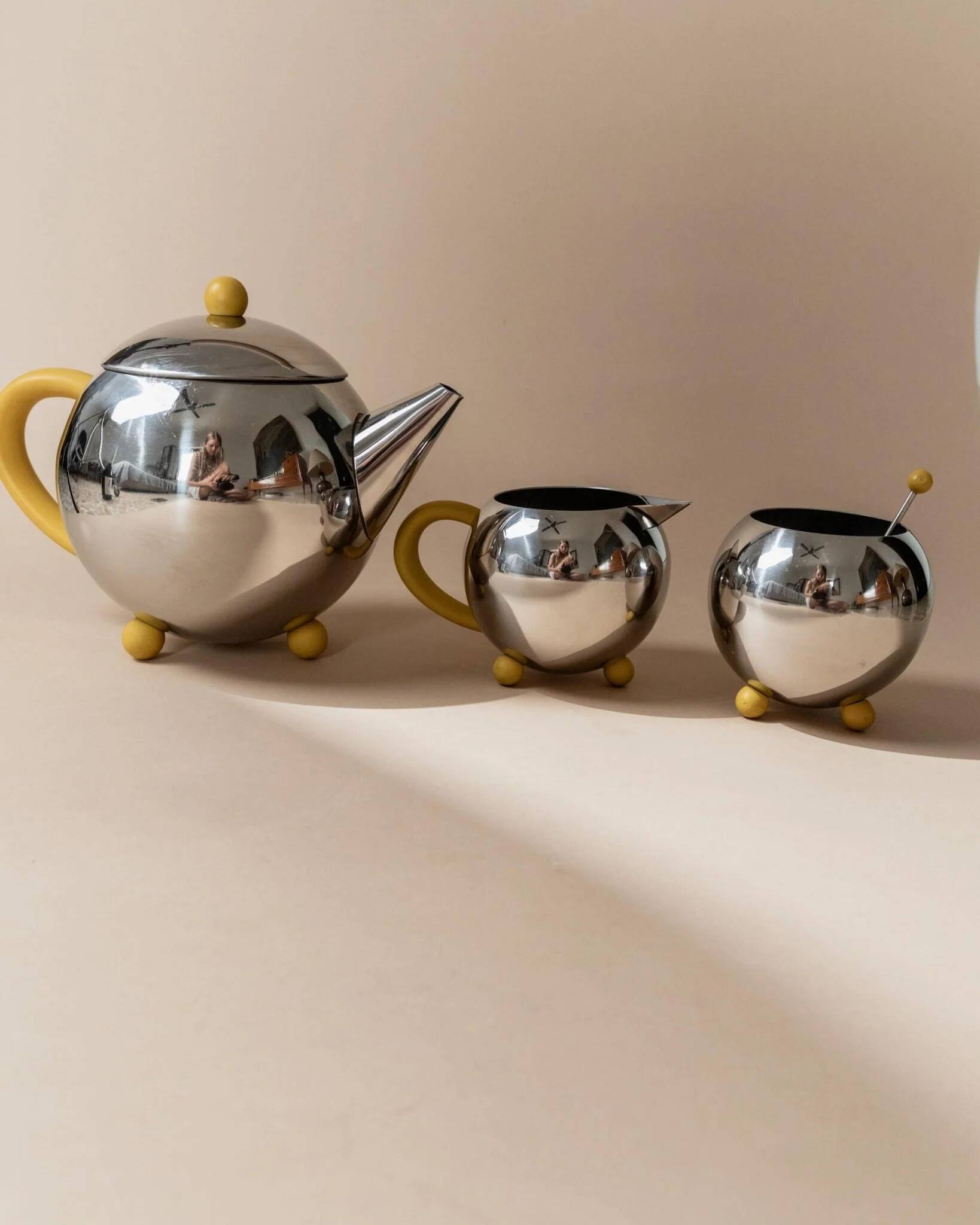Space Age Vintage 1980s Stainless Steel Tea and Coffee Set with Yellow Accents Teapot Creamer and Sugar Bowl