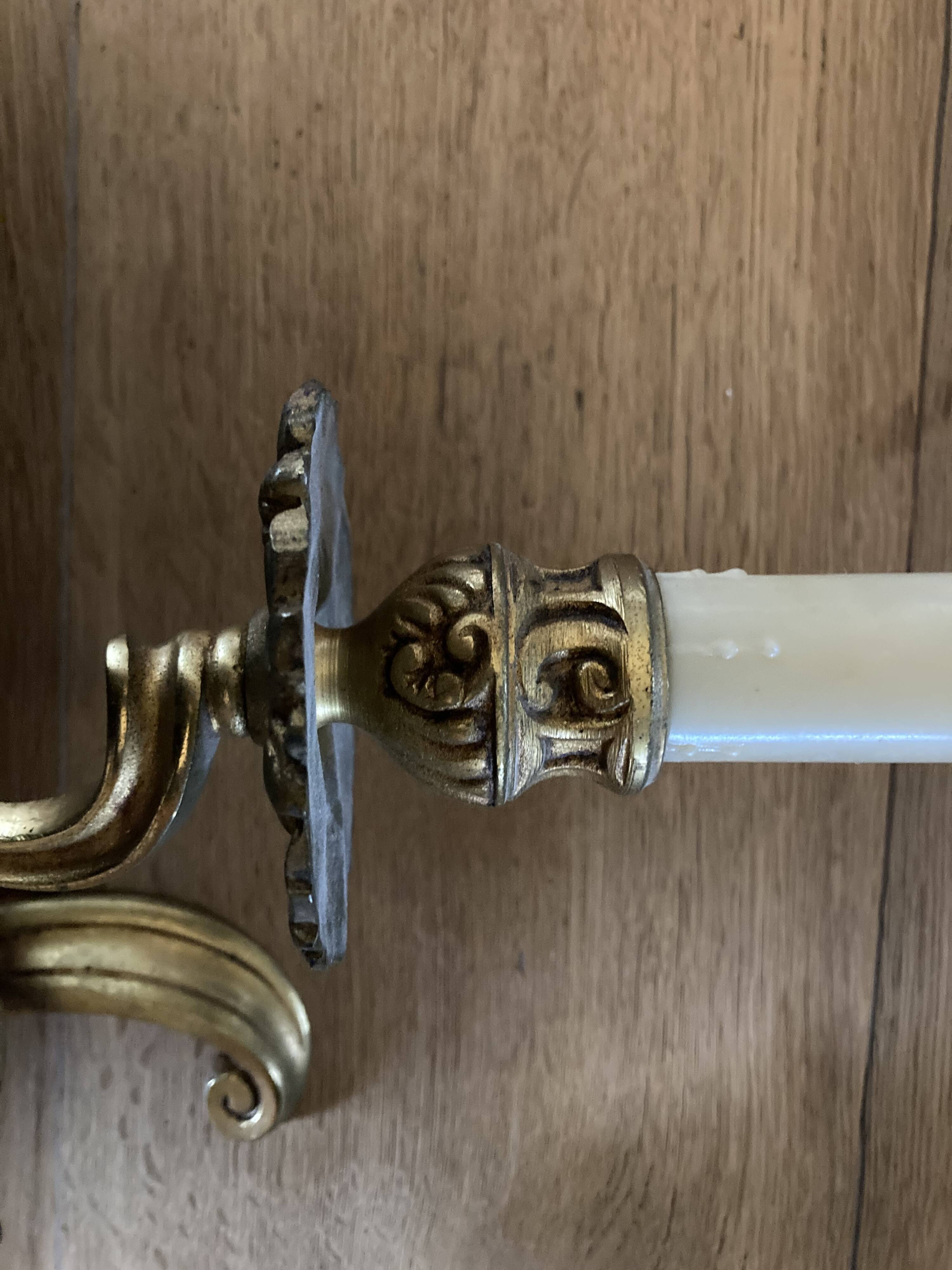 Pair of bronze wall lamps