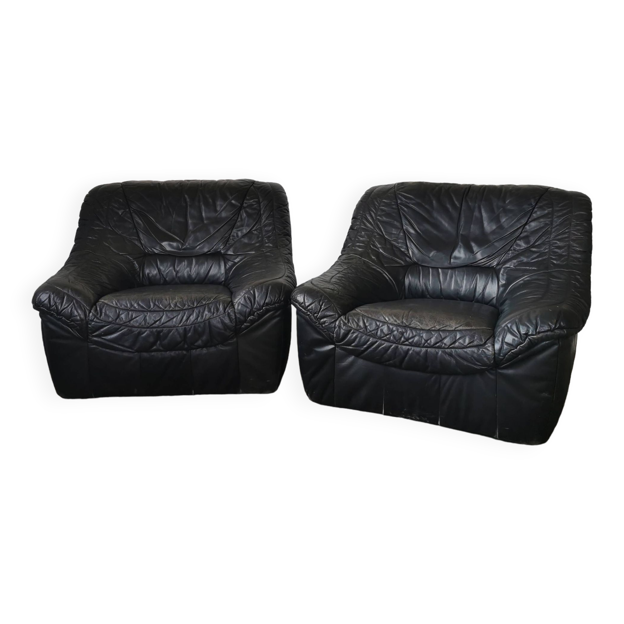 Pair of black leather armchairs from the 80s