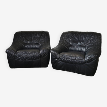 Pair of black leather armchairs from the 80s