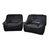 Pair of black leather armchairs from the 80s