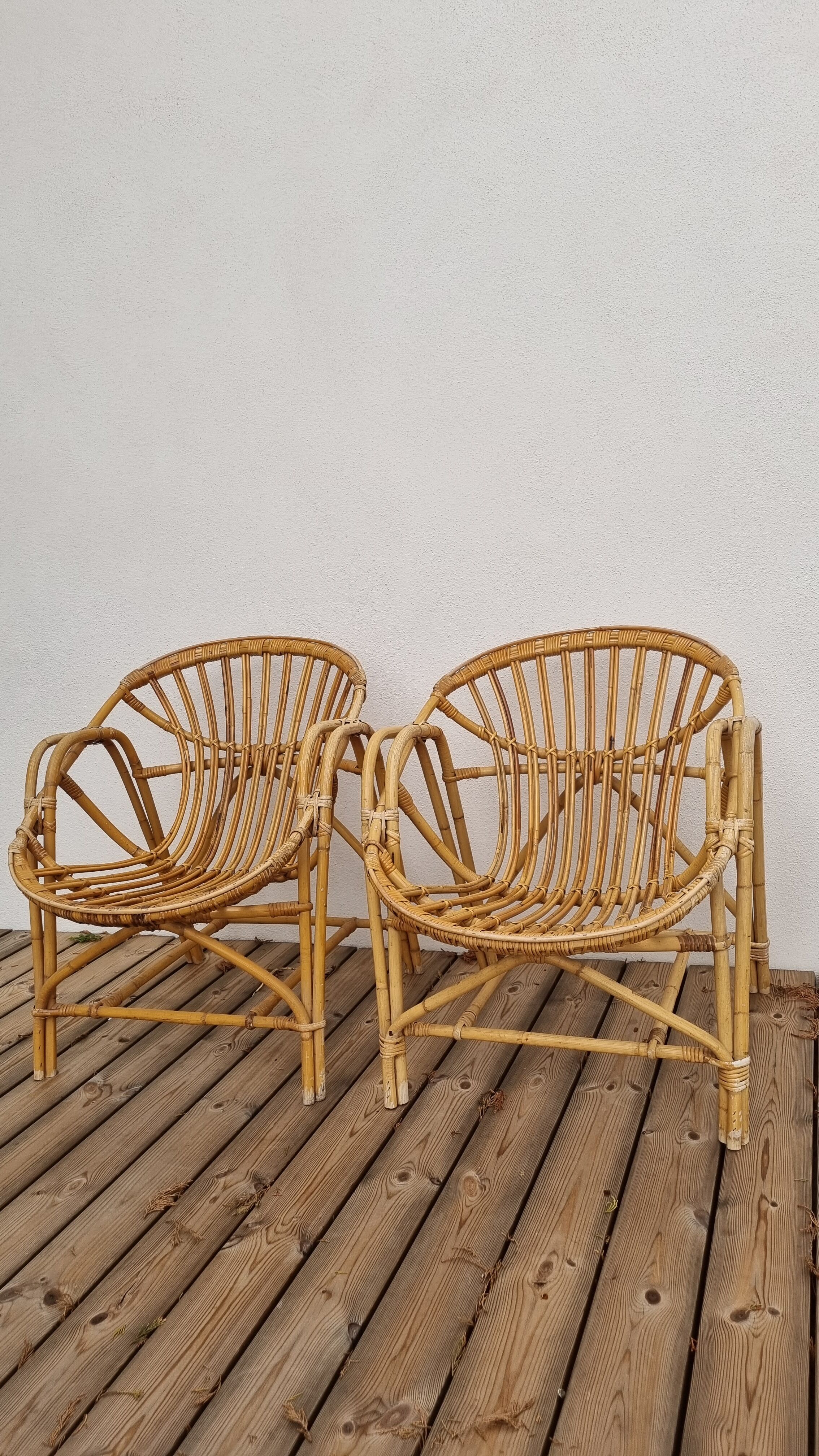 pair of Coquille rattan armchairs