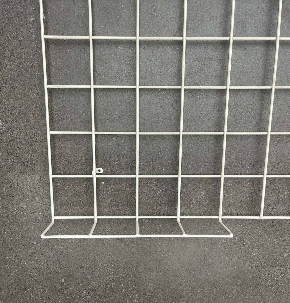 Minimalist white wire coat rack from mid-century Germany, 1960s.