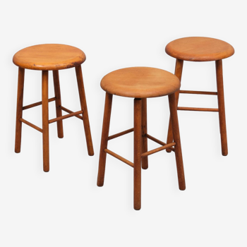 Three authentic wooden stools 1950s Holland